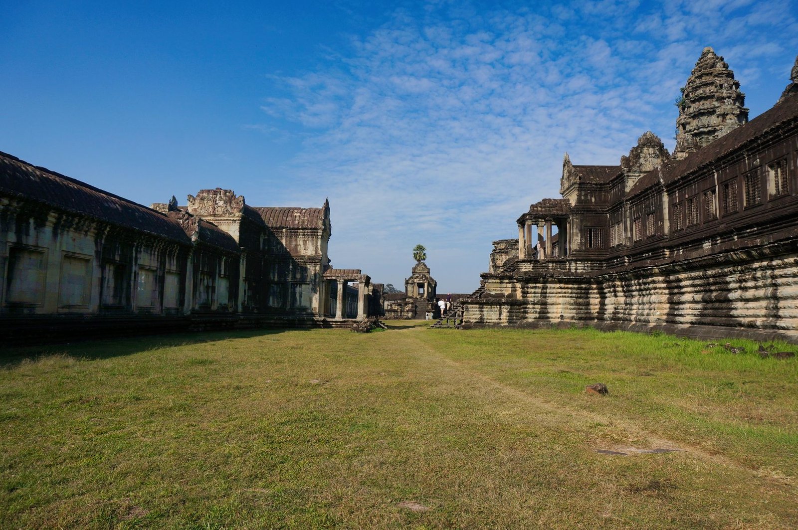 Angkor Wat reflected in water during a Cambodia budget trip