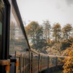 tea-covered hills and railway in sri lanka's central highlands