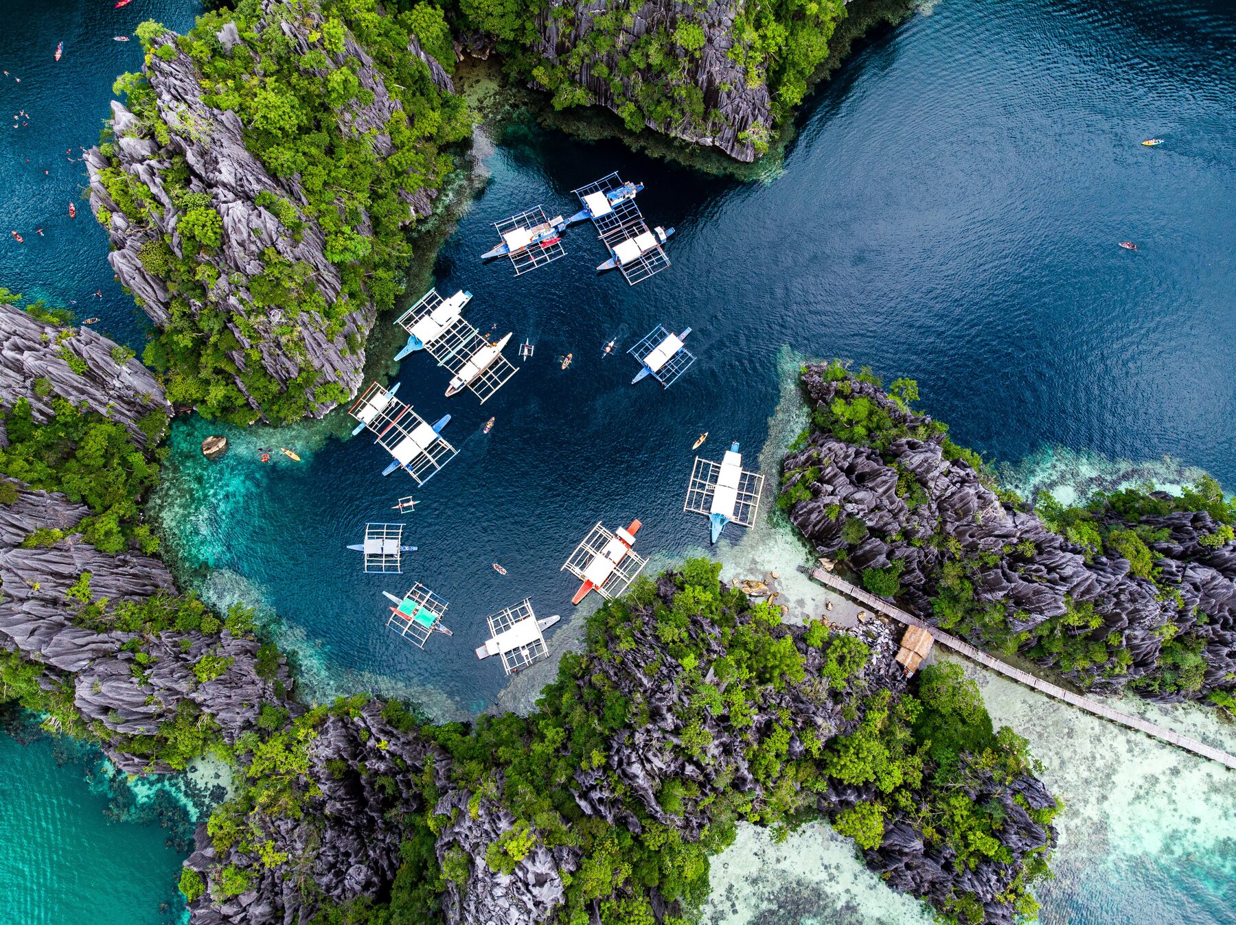 Traditional boats used on a Philippines island hopping itinerary